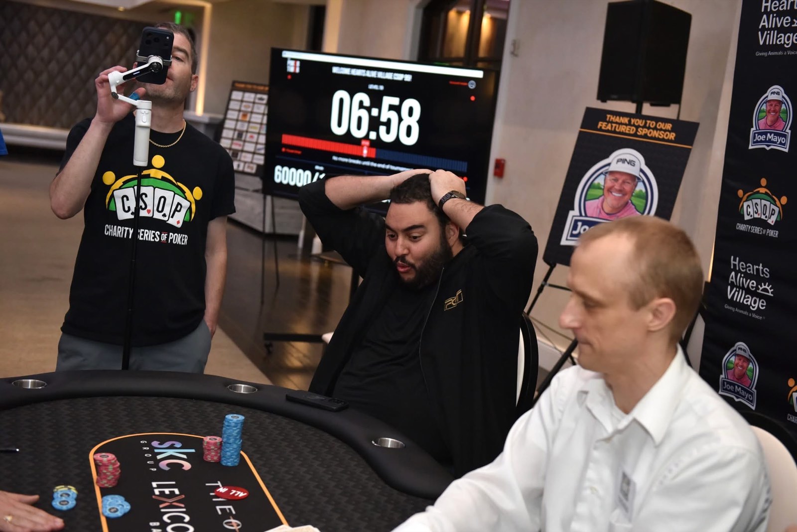 A Hearts Alive Village Charity Series of Poker event being filmed at the table